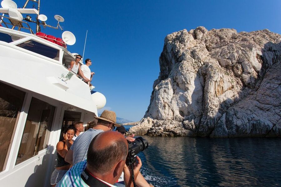 Baška: Rab Island and Zavratnica Fjord Boat Tour with Lunch - Rab town time: walking among thousands of years