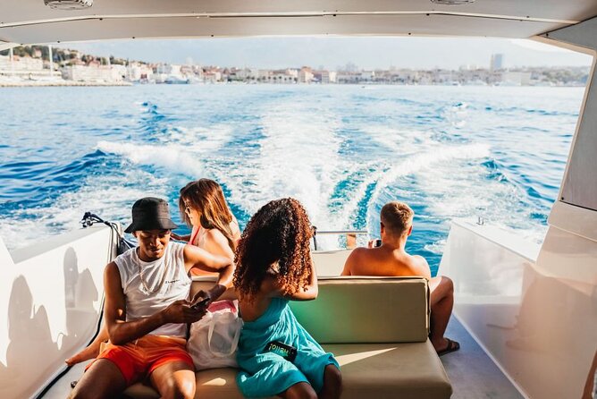 Blue Cave and Hvar 5 Islands full-day Speedboat Tour from Split - Komiža and Stiniva: small village stops and big-cliff swimming