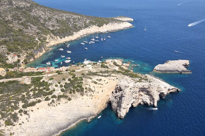 Blue Cave and Town Hvar with 5 Island Boat Tour - Komiža on Vis: fishing town streets, cliffs, and a museum stop without pressure