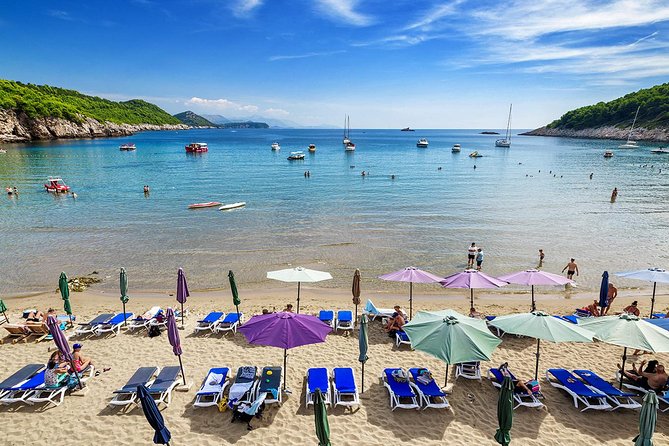 Blue Cave Premium Half-Day Tour with Panoramic Old Town View - Šunj Beach: The famous sandy break and cocktail hour