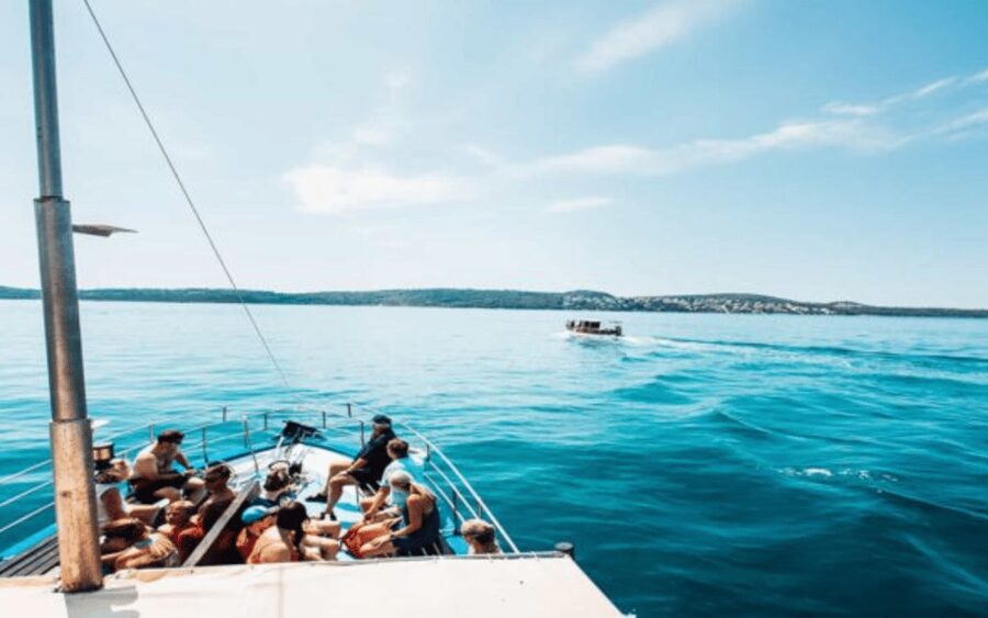 Blue Lagoon Boat Tour from Trogir with Lunch and Drinks - Getting aboard with Bura Line at the pier