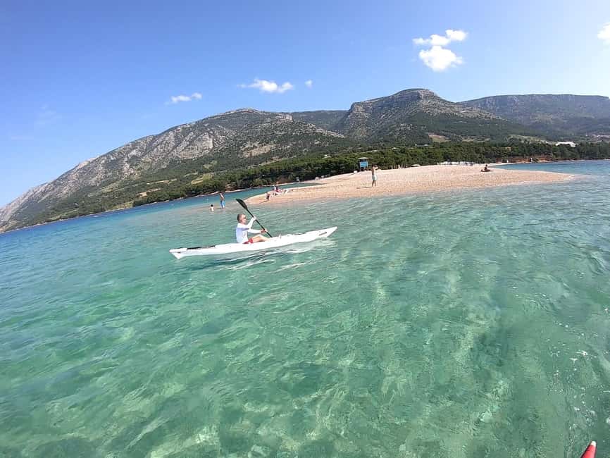 Bol: Zlatni Rat Beach Kayak Tour with Snorkeling - Zlatni Rat Beach looks different when you’re paddling