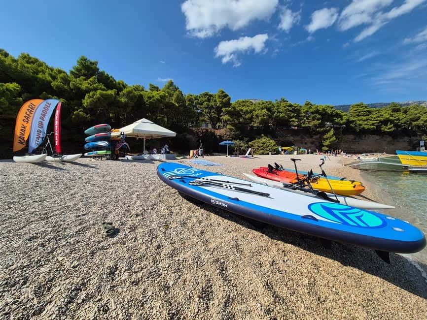 Bol: Zlatni Rat Beach Stand Up Paddle Board Rental - Getting started at the orange and blue tent