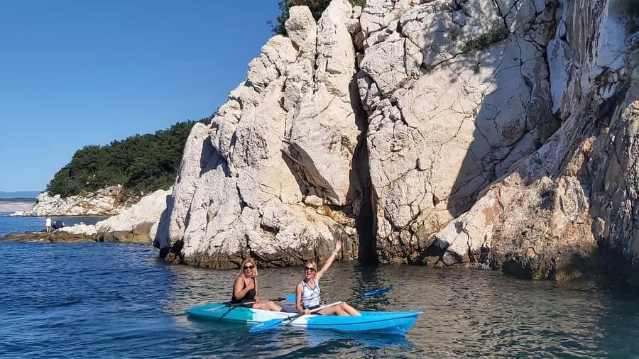 Crikvenica: Coastline Guided Kayak Tour with Viewpoint Hike - Back to the beach: the quick swim and relaxing payoff