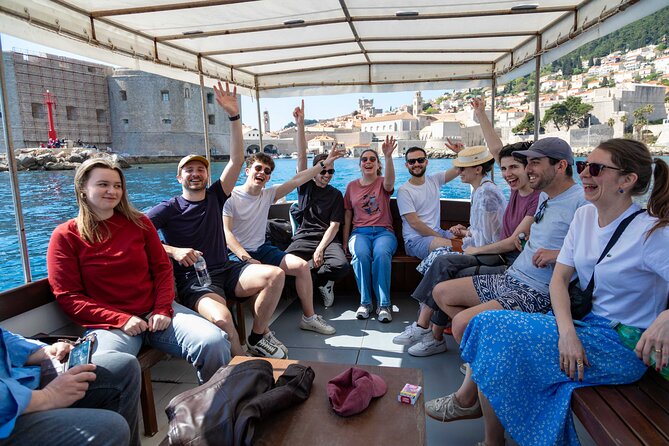 Dubrovnik 45-Minute Boat Tour Around Old Town Walls - Old Town Walls from the water: towers, cliffs, and angles you can’t recreate