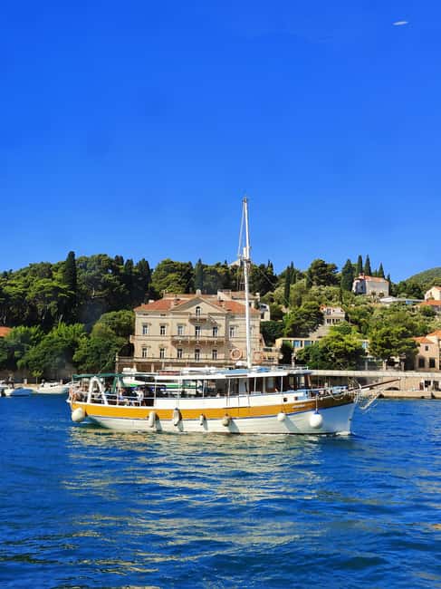 Dubrovnik: Blue Cave & Elaphiti Islands Full-Day Boat Tour - Lopud Island: sandy beach time, monastery sights, and old-hotel vibes