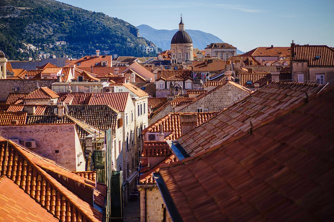 Dubrovnik Cable Car Ride, Old Town Walking Tour plus City Walls - Major Stradun landmarks: fountains, columns, and power