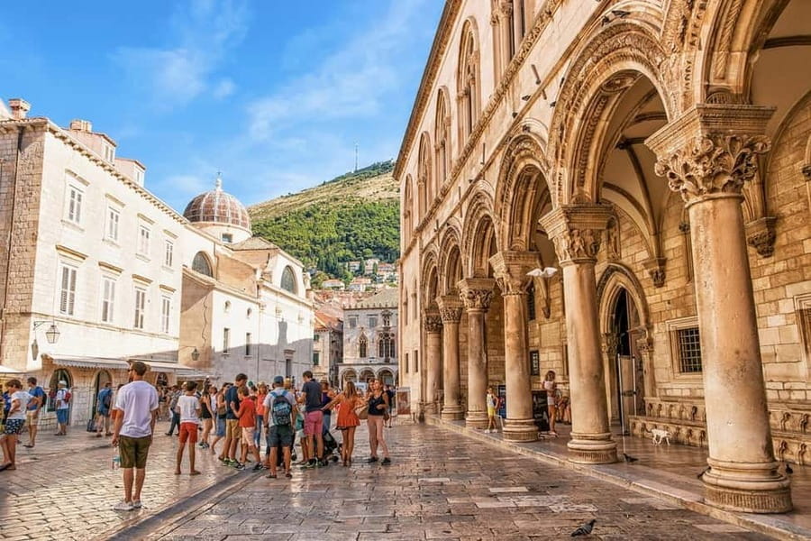 Dubrovnik: City Walls, Old Town Walking Tour & Adriatic View - Franciscan Monastery and its famous pharmacy stop