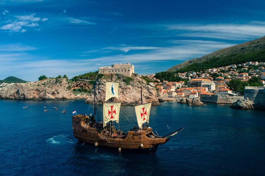 Dubrovnik: Galleon Sunset Cruise with a Live Guide & Drink - Boarding Galleon Tirena: welcome drink, deck vibe, and what’s included