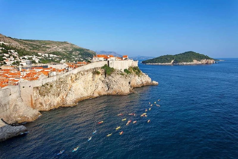 Dubrovnik: Guided Sunset Sea Kayaking Tour with Wine - Getting Started at Pile Gate: Safety Briefing and Real Paddling Tips