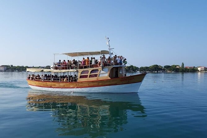 Dubrovnik Islands Boat Tour with Lunch and Unlimited Drinks - Koločep: pine and carob shade, churches, and beach time