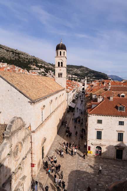 Dubrovnik Old Town: Night tour with History, Wine & Bites - Stradun: The Main Street That Explains the City