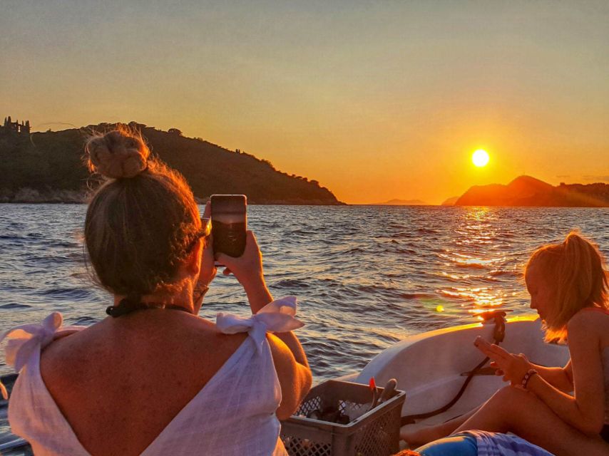Dubrovnik: Private Boat Cruise at Sunset with Champagne - Dubrovnik city walls and Fort Lovrijenac, explained from the sea