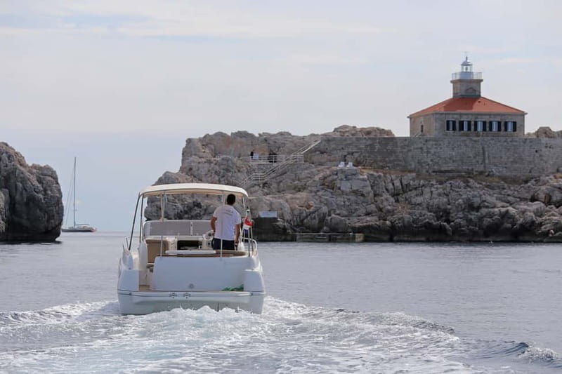 Dubrovnik: Private Elaphite Islands Speedboat Tour - Stop 1: Koločep beaches, orange and olive trees, and no cars