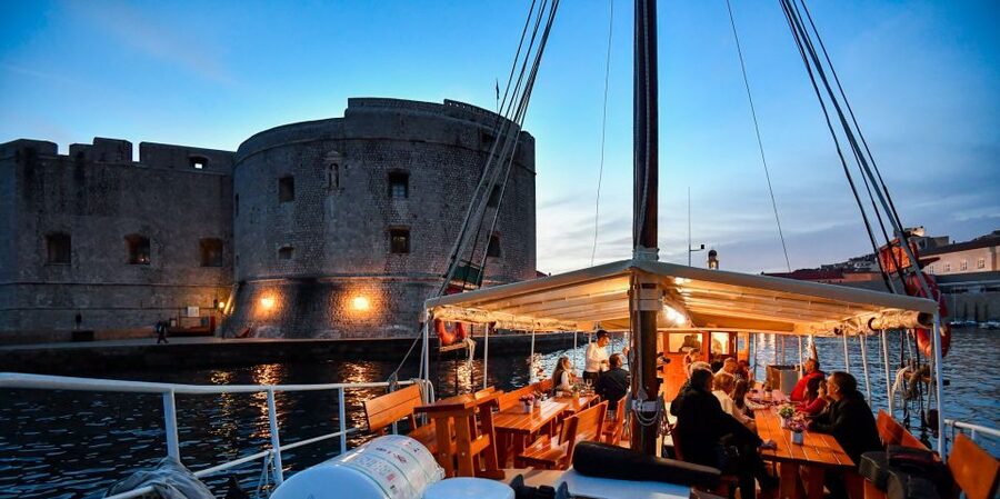 Dubrovnik: Sunset Dinner Cruise around the Old Town - City Walls at night, plus the panoramic ride feeling
