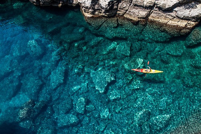 Dubrovnik: Sunset Kayaking & Snorkeling with water &wine - Paddling Dubrovnik toward Lokrum, then Betina Cave