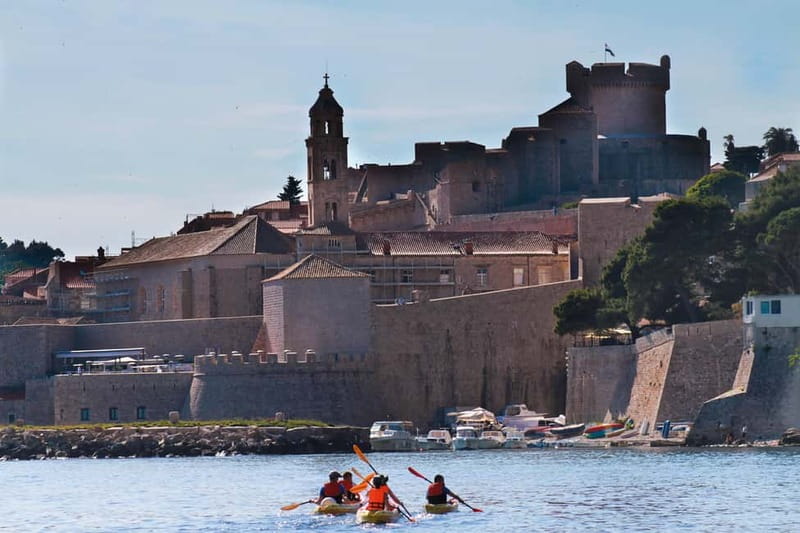 Dubrovnik: Sunset Sea Kayaking Tour - The history lesson you actually remember, delivered in English