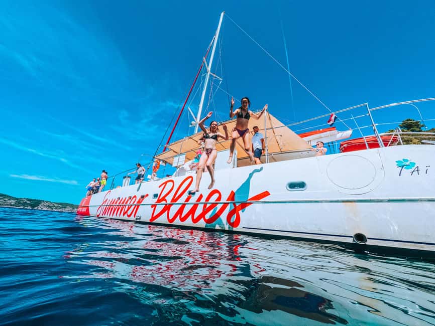 From Brač Island: Catamaran Tour with Food & Drinks - Zlatni rat at Golden Horn: the Bol beach highlight with a realistic crowd vibe