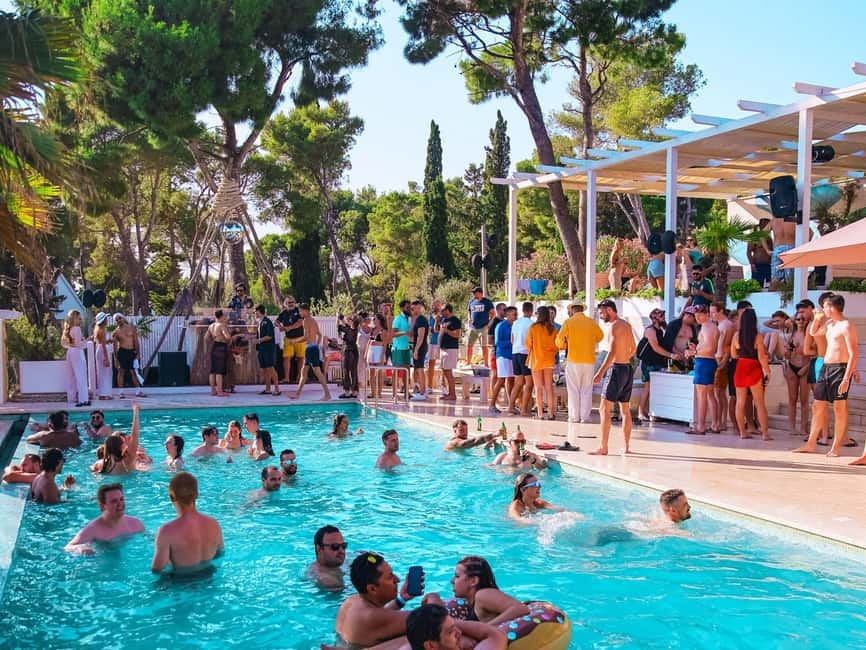 From Split: Brač Island Beach Bar and Pool Party - Milna pool party at the beach bar resort