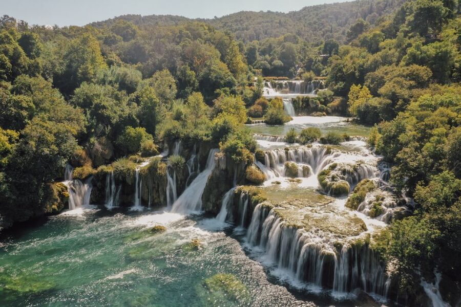From Split: Krka Waterfalls Tour with Boat Cruise & Swimming - A small ethno-village stop, culture without the museum fatigue