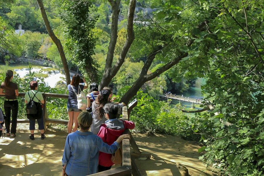 From Split: Krka Waterfalls Tour with Boat Ride & Swimming - Skradinski Buk: the waterfall moment plus a photo-and-walk window