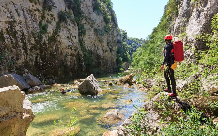 From Split or Zadvarje: Cetina River Canyoning - Walking, swimming, and sliding: the core moves of the day