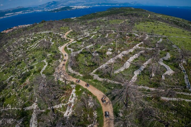 From Split & Trogir: ATV Quad Tour on Island Čiovo - Coming back through Slatine: the fishing village return feel