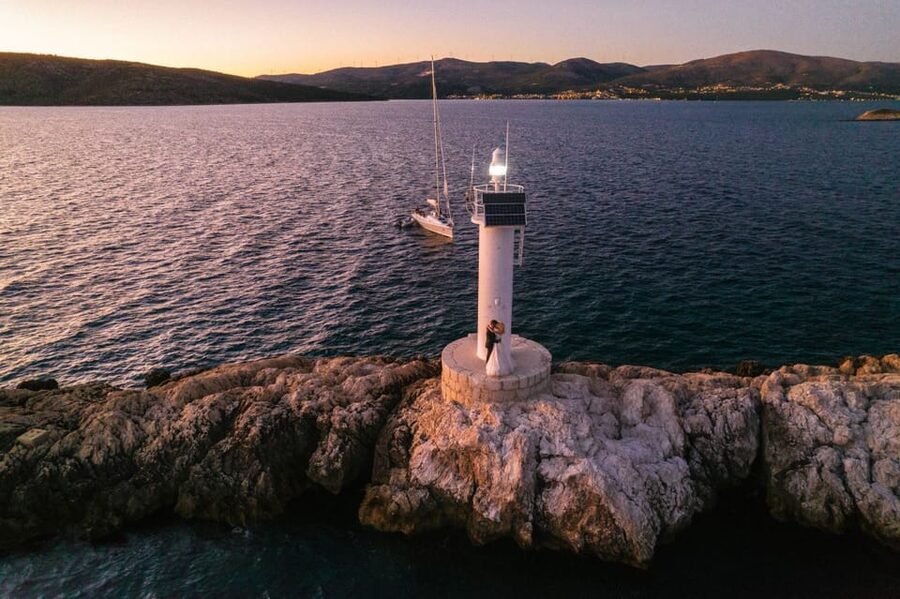 From Trogir Day sailing (private tour) - Kritule Bay at around 12:00: turquoise water with a quieter shoreline