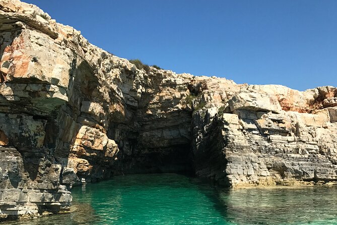 Full-Day Boat Tour of the Medulin Archipelago from Medulin - Porer lighthouse pass: great photos, no docking at the cliffs