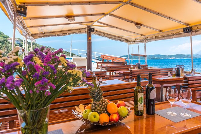 Full-Day Dubrovnik Elaphite Islands Cruise with Lunch and Drinks - Kolocep Island: caves and cliffs, plus snorkeling and sandy beach breaks