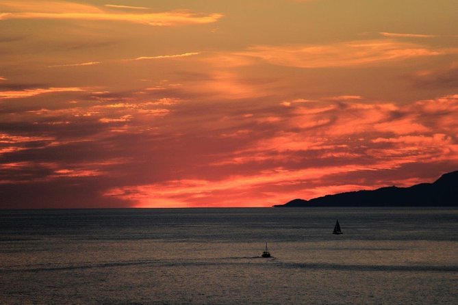 Golden hour SUNSET CRUISE from Dubrovnik Old Town - Onboard comfort: music, crew energy, and the champagne-and-fruit moment