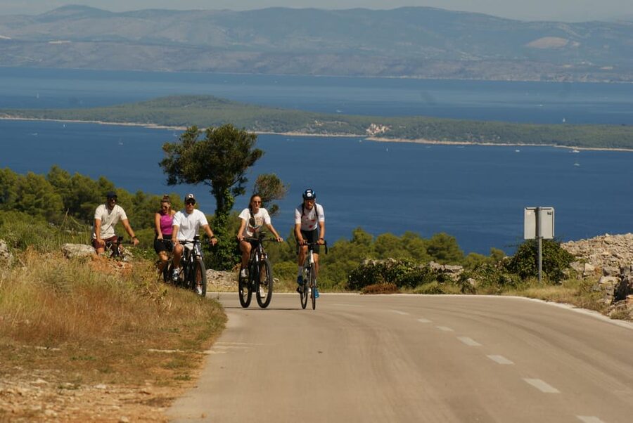 Hvar Island E-Bike Tour with Wine Tasting and Starters - The rhythm of photo stops and viewpoint climbs