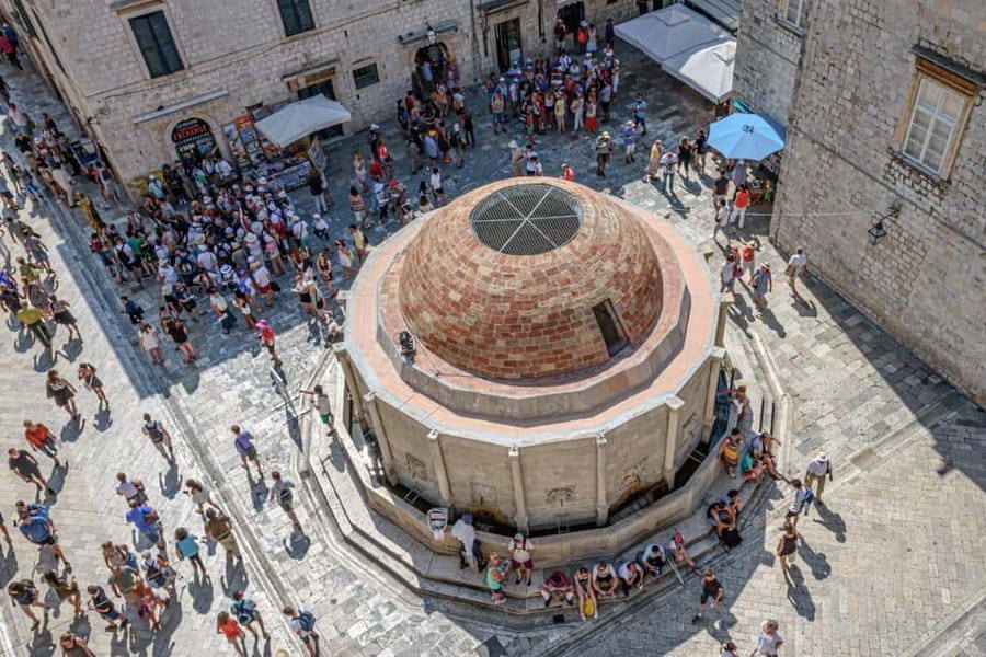 Jewish History of Dubrovnik Old Town Private Walking Tour - Ploče Gate and Sponza Palace, where daily life and power meet