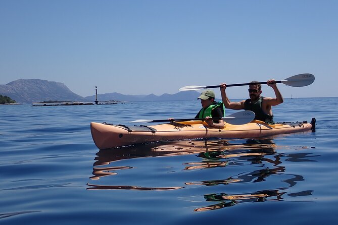 Kayaking Korčula's Paradise -Half Day Guided Kayak Tour - Swim and snorkel breaks in clear water