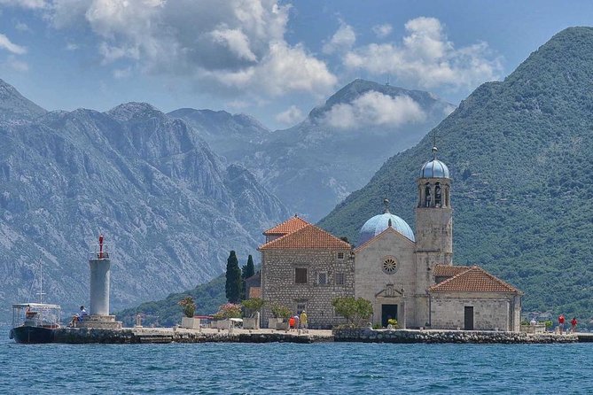 Kotor Bay Day Trip from Dubrovnik with Boat Ride to Lady of the Rock - Perast: Venetian Palaces, Church Towers, And the Lady of the Rocks Story