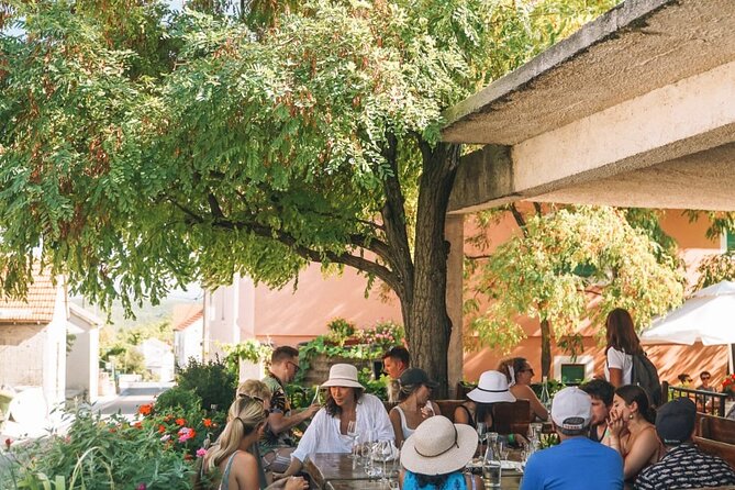 Krka Waterfalls, Food & Wine Tasting, Boat Ride & Zadar Old Town - Stop 2: Sladic Winery tasting with four wines, olive oil, and cheese