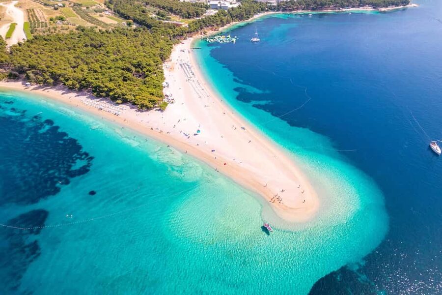 Makarska: 3-Island Speedboat Golden Horn & Blue Lagoon Tour - First Hit: Nugal Beach for Photos and Cliffs