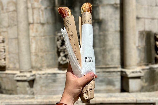 Old Town Dubrovnik Food Tour of 10+ Authentic Croatian Tastings - Stop 5: black risotto and meat ragu macaroni, paired with red wine