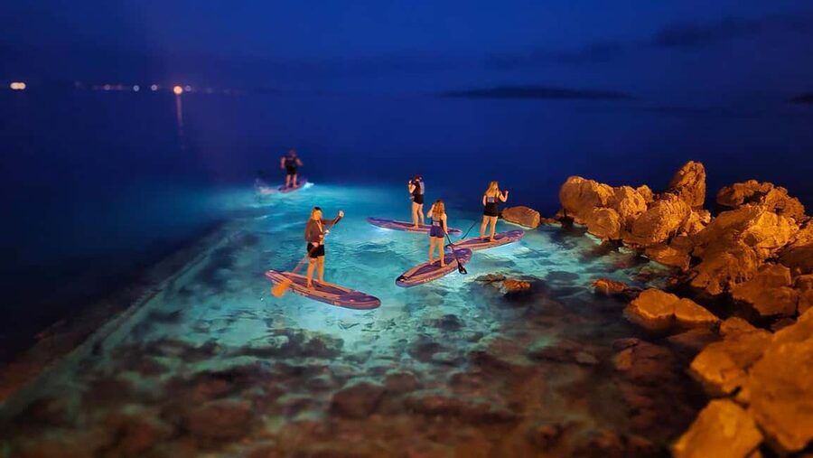 Opatija: Guided SUP Paddleboarding Adventure at Night - What happens first: instructions on land and the basics of standing up