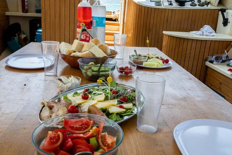 Port Bunarina: Scenic Boat Trip with Lunch & Swimming - Porer Lighthouse views and the late-afternoon finish