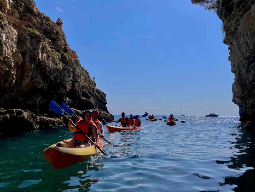 Pula: Cave, Canyon and Island Kayak Tour Snorkel&Explore - Entering Grotta di Quarzo by kayak, seeing formations up close