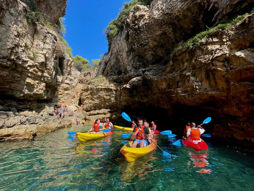 Pula: Cave, Canyon and Island Kayak Tour Snorkel&Explore - Paddling Pula Canyon, where the coast becomes your route