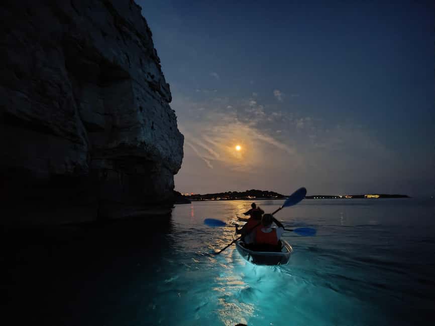 Pula: Istria Cave LED Illuminated Kayak Tour by Night - Entering the night at Ambrela Beach in Pula