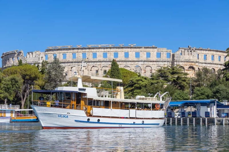 Pula: National Park Brijuni, 2 swimming stops, lunch, drinks - Cruising Brijuni on a wooden boat, with slide time