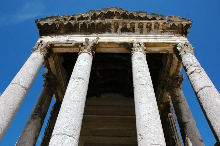 Pula: Old Town Walking Tour for Foodies with Dinner and Wine - Outside the Pula Amphitheatre: Roman Pula in a practical first stop