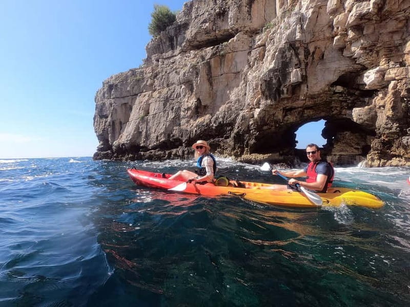 Pula: Sea Adventure – Boat, Kayak, Snorkeling & Cliff Jumps - Hidden beach stop: snorkel, swim, and cliff-jump option