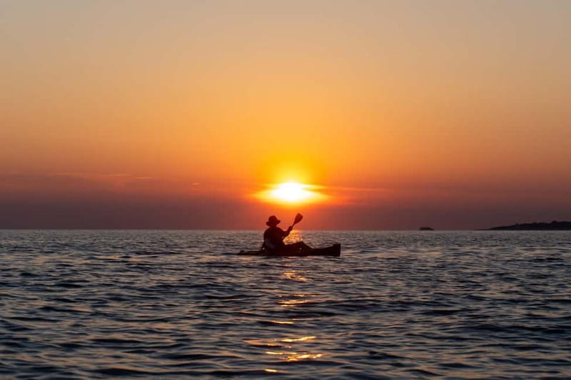 Pula:Sunset Tour By Clear Kayak,Cave,Swim & Cliff Jumping - The kayak setup: clear water, dry comfort, and masks ready