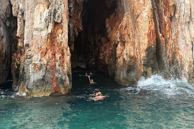 Red Rocks and Hvar Full Day Tour from Split and Brac - Red Rocks near Hvar: steep red cliffs, quick photo ops, and snorkeling time