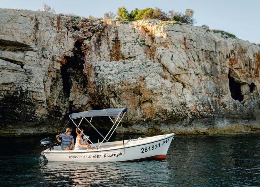 Rent a boat up to 6 person on Cape Kamenjak Nature Park - Your Boat Setup: Bimini Shade, Life Vests, and the 6 HP Outboard