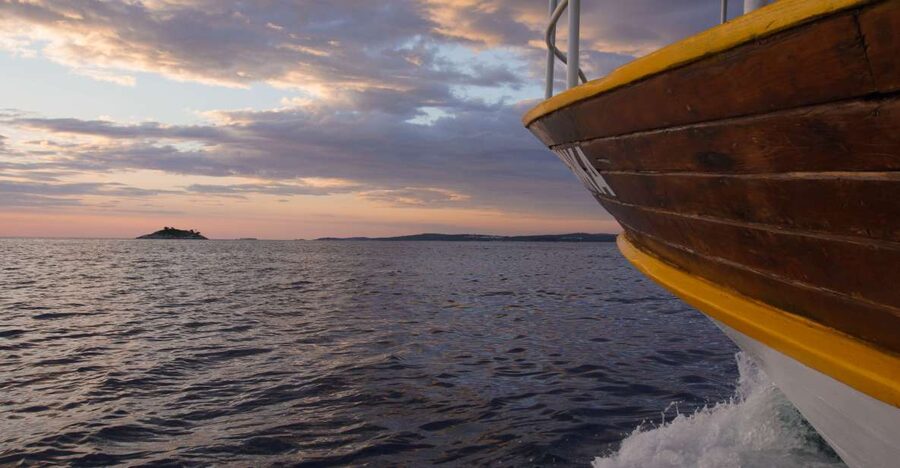 Rovinj: Sunset Boat Trip with Dolphin Watching - Valdibora start: your first Rovinj panoramas before the water turns gold